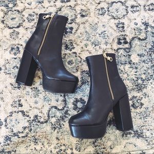 NWT!! Super cute platform boots. Never worn!!